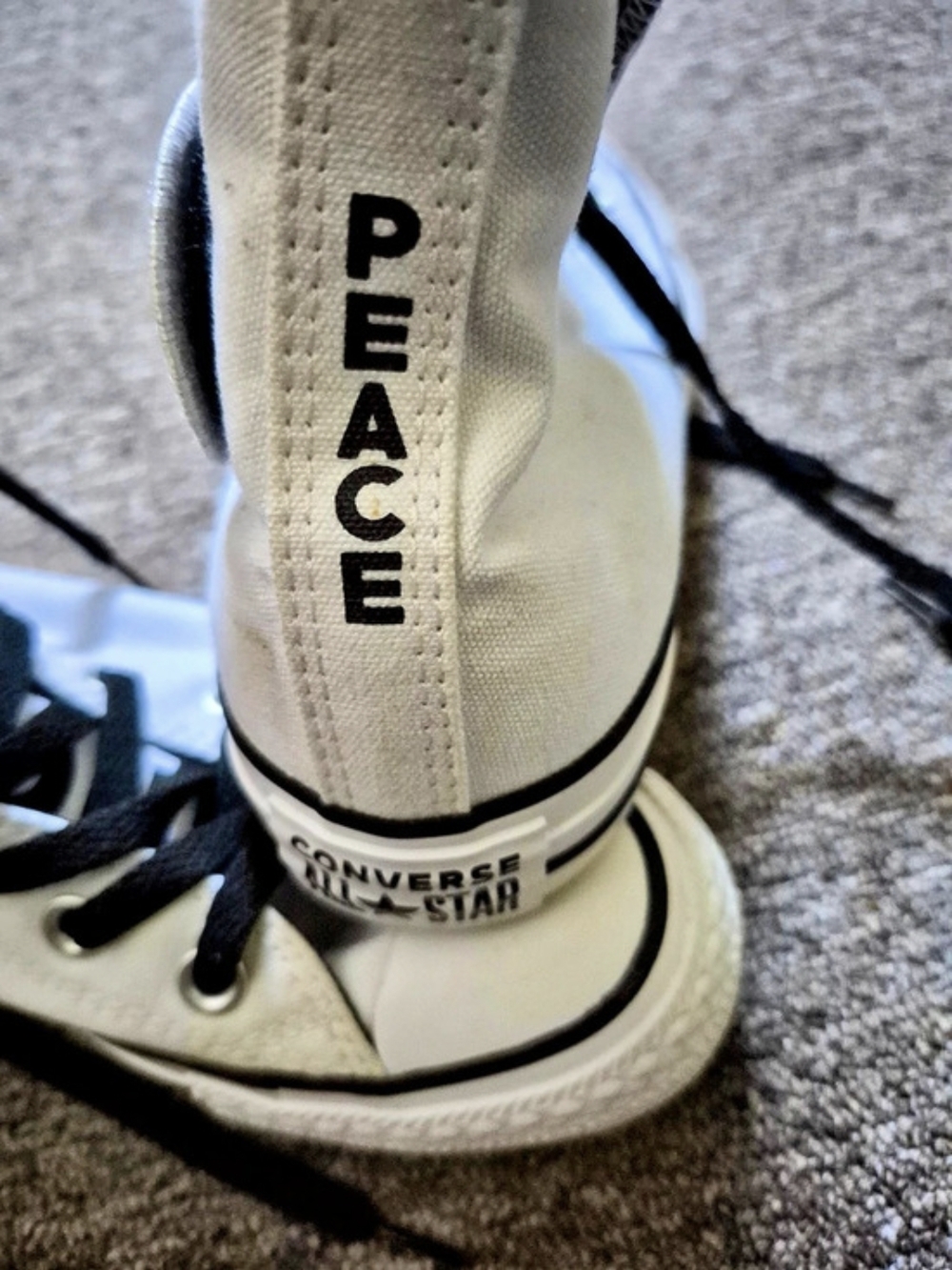Converse Chuck Taylor All Star Peace Graphic High Top Sneakers in White & Black